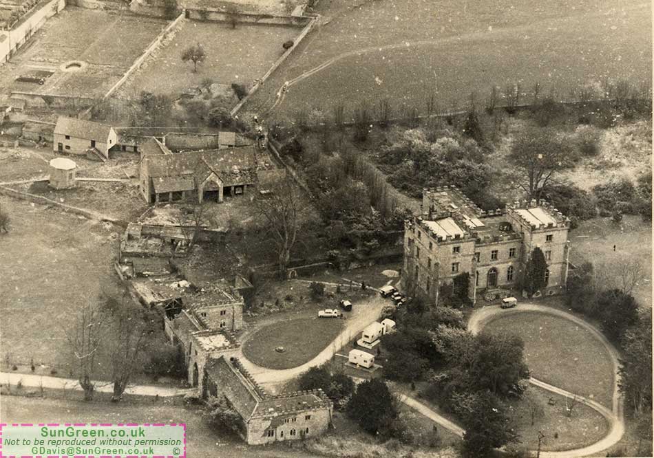 A photo of Clearwell Castle from the air.