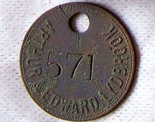 A photo of a miner's token from Arthur and Edward Colliery, Lydbrook, Gloucestershire