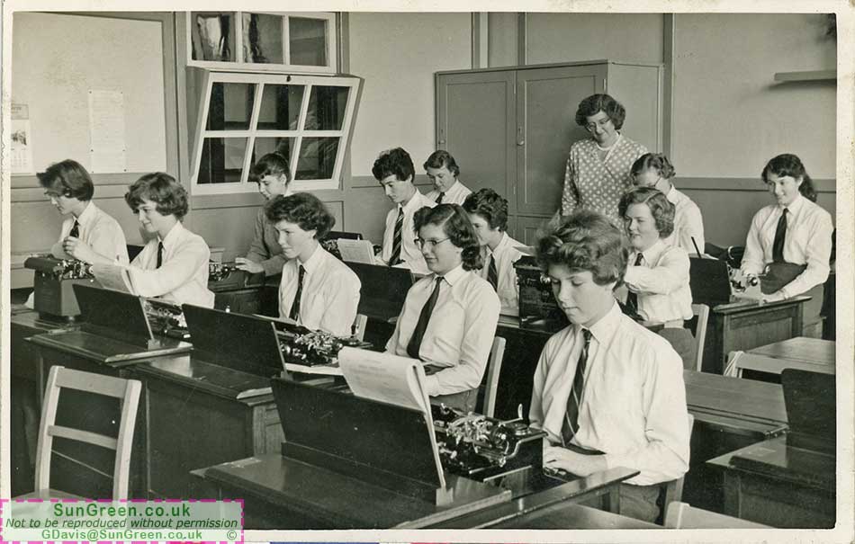 An old photo of a typing class at Lydney Grammar School