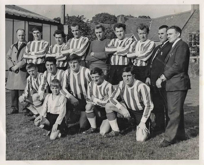 An old photo of a Bream football team who were charity cup winners