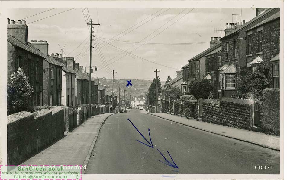 A photo of Cinderford looking down Belle Vue Road.