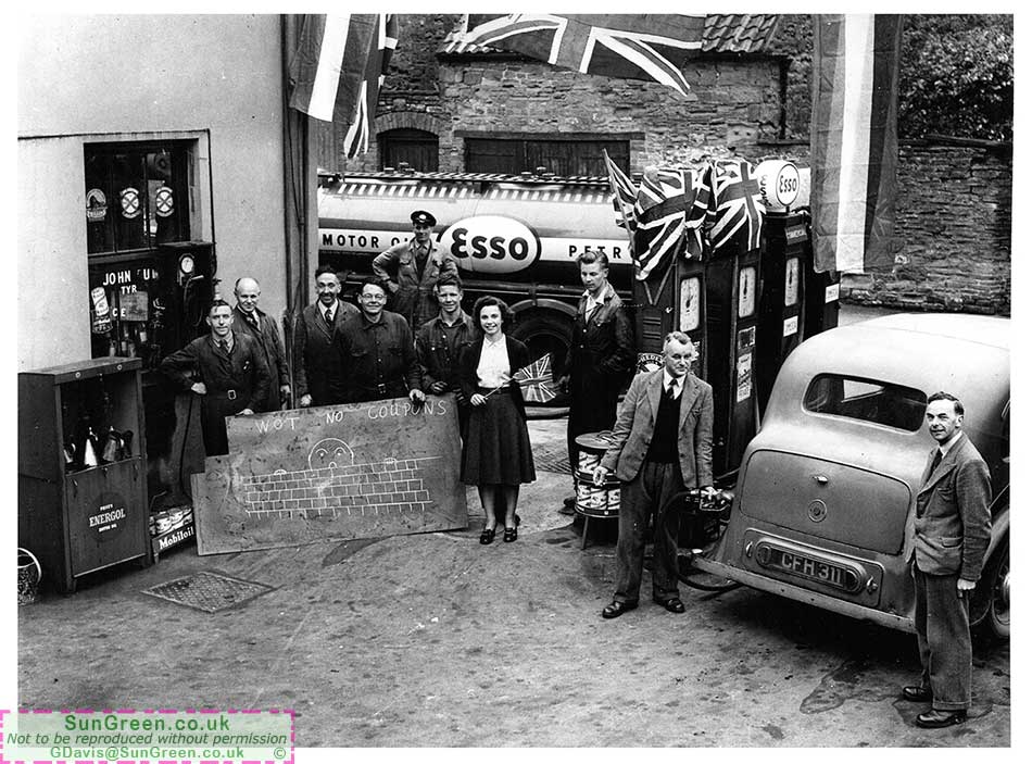 An old photo of Coleford people outside Higgs and Niblet garage.