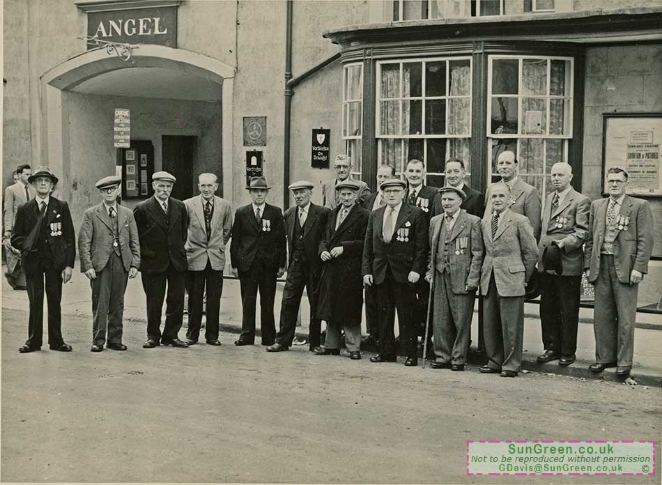 A photo of men outside the Angel Hotel, Coleford