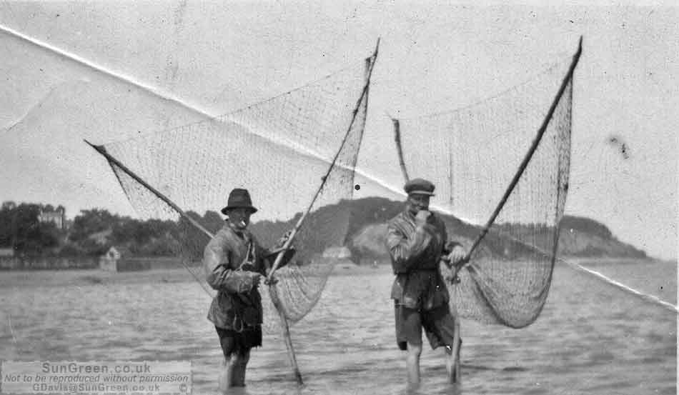 An old photo of fisherman on the river Severn