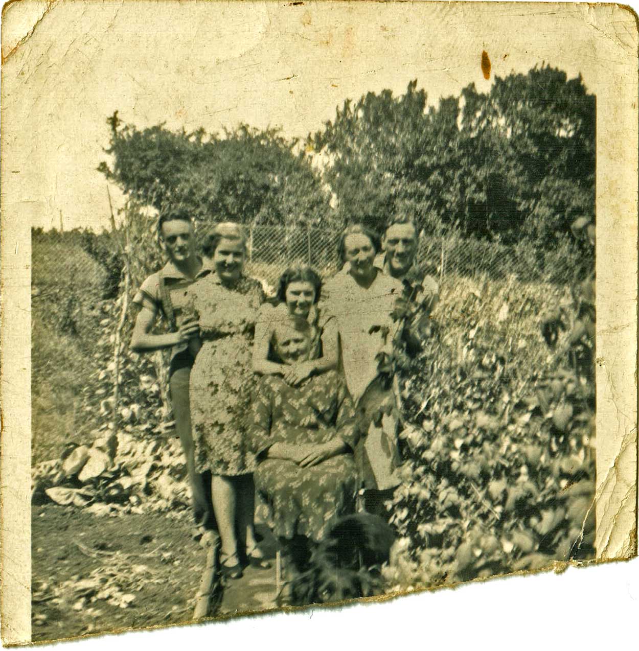 A family photo in the garden.